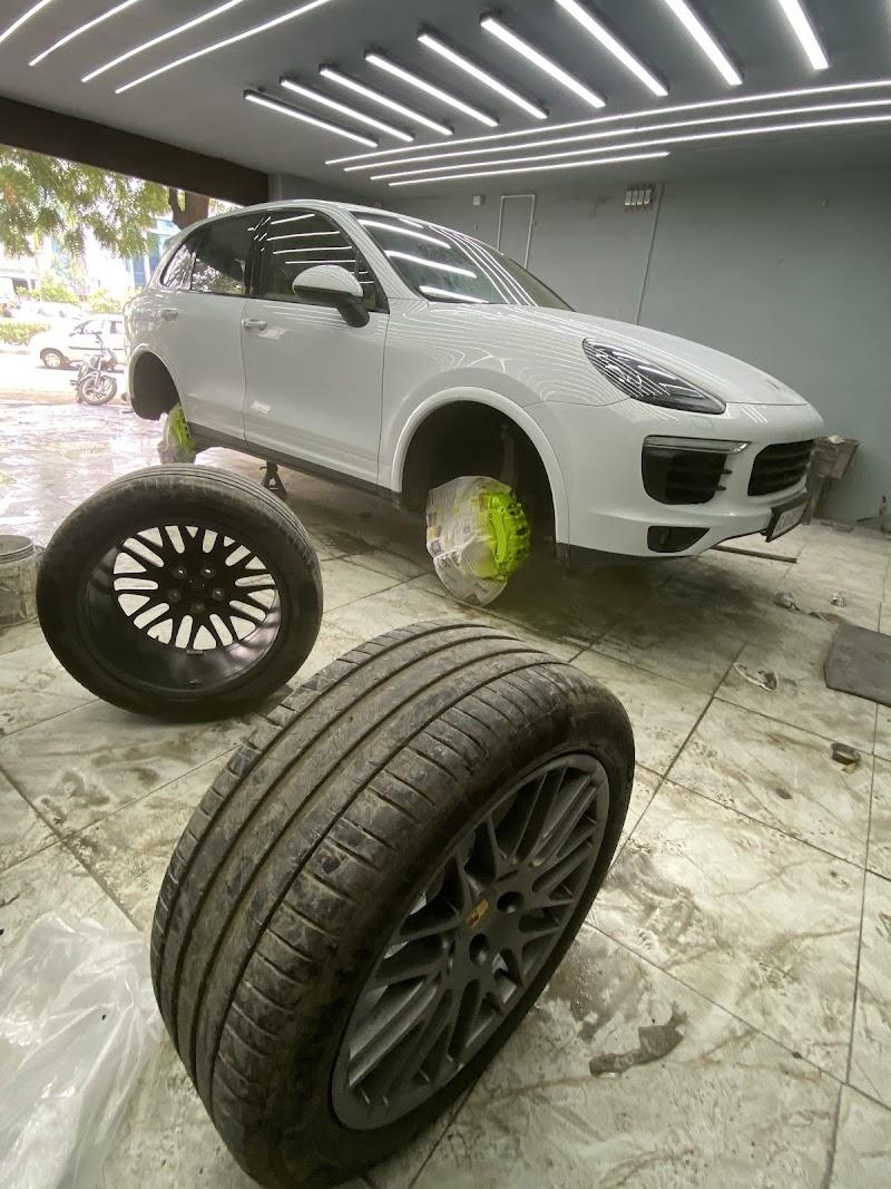 Porsche Cayenne on stands for alloy wheel and tyre upgrade at V8Hub