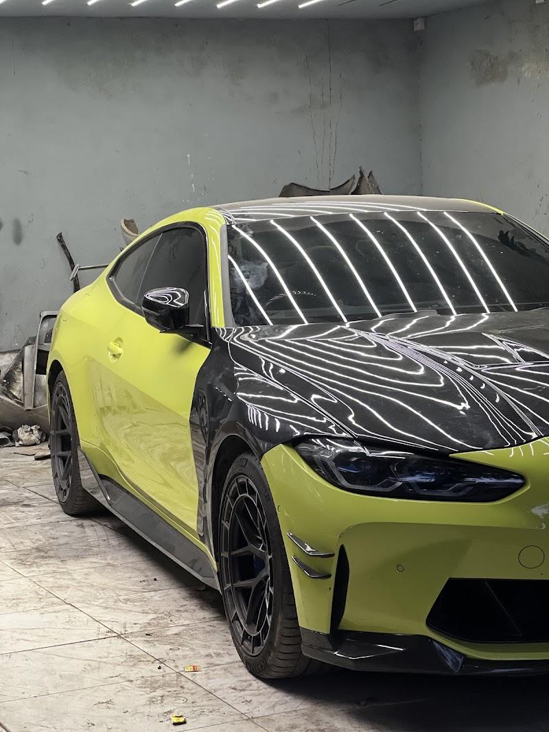 BMW M performance car in lime and black custom wrap at V8Hub Performance